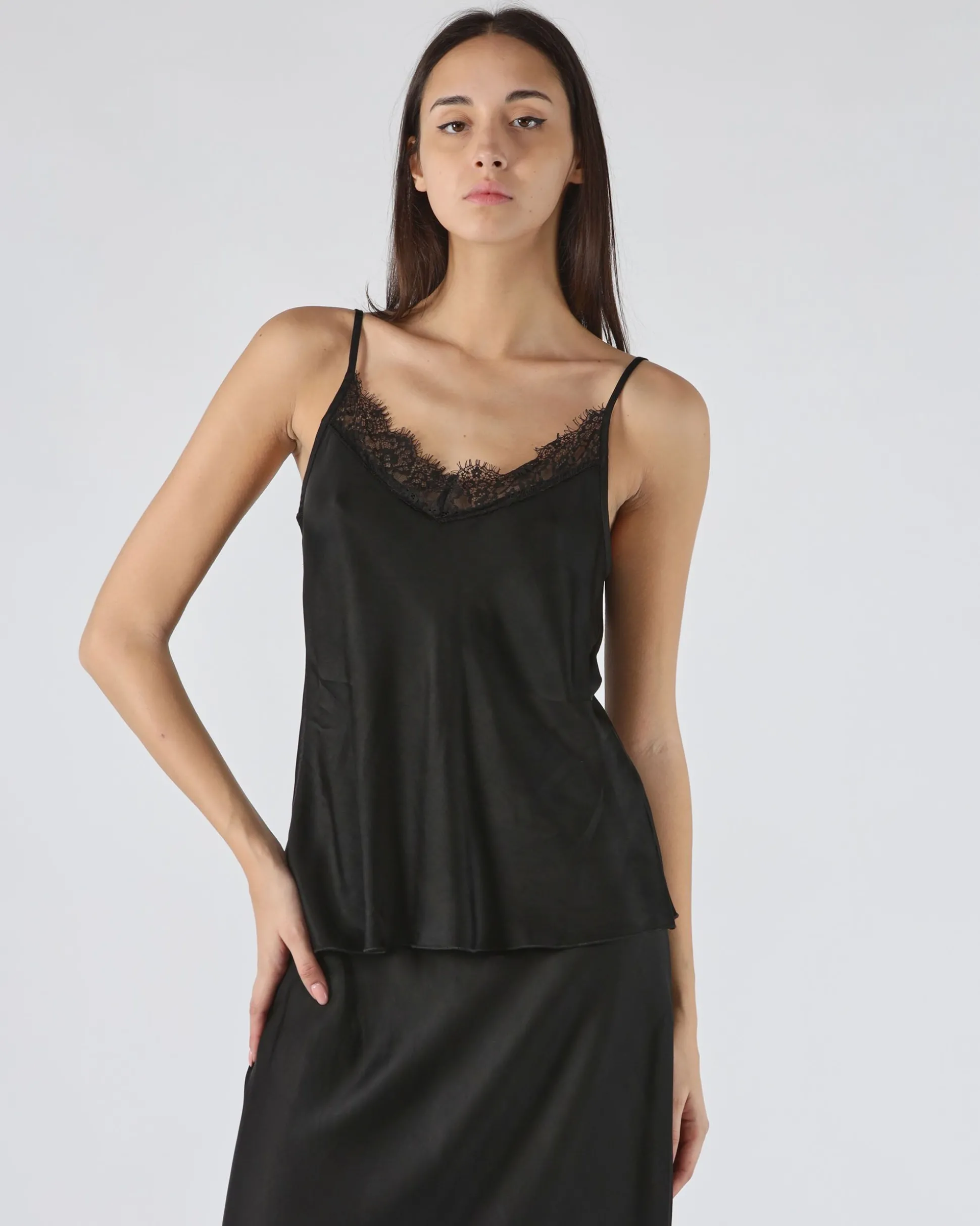 Top unito con pizzo nero